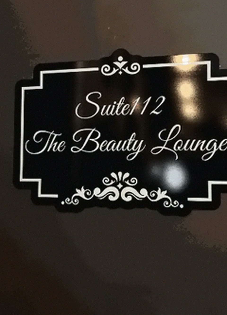 Suite 112 sign at The Beauty Lounge